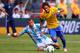 EAST RUTHERFORD, NJ - JUNE 9: Javier Mascherano #14 of Argentina makes a slide tackle on the ball controlled by Neymar #11 of Brazil during the second half of an international friendly soccer match on June 9, 2012 at MetLife Stadium in East Rutherford, New Jersey. Argentina defeated Brazil 4-3. (Photo by Rich Schultz/Getty Images)
