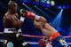 LAS VEGAS, NV - JUNE 09: (R-L) Manny Pacquiao throws a left to the head of Timothy Bradley during their WBO welterweight title fight at MGM Grand Garden Arena on June 9, 2012 in Las Vegas, Nevada. (Photo by Kevork Djansezian/Getty Images)