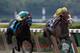 ELMONT, NY - JUNE 09: Union Rags ridden by John Velazquez (R) outruns Paynter ridden by Mike Smith (L) to win the 144th Belmont Stakes at Belmont Park on June 9, 2012 in Elmont, New York. (Photo by Rob Carr/Getty Images)