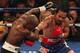 LAS VEGAS, NV - JUNE 09: (R-L) Manny Pacquiao lands a right to the head of Timothy Bradley during their WBO welterweight title fight at MGM Grand Garden Arena on June 9, 2012 in Las Vegas, Nevada. (Photo by Jeff Bottari/Getty Images)