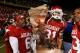 BATON ROUGE, LA - NOVEMBER 23: Members of the Arkansas Razorbacks celebrate with 'The Boot' trophy after defeating the #1 ranked Louisiana State University Tigers in triple overtime 50-48 at Tiger Stadium November 23, 2007 in Baton Rouge, Louisiana. (Photo by Chris Graythen/Getty Images)