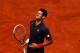 PARIS, FRANCE - JUNE 11: Novak Djokovic of Serbia looks dejected during the men's singles final against Rafael Nadal of Spain on day 16 of the French Open at Roland Garros on June 11, 2012 in Paris, France. (Photo by Clive Brunskill/Getty Images)