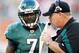MIAMI GARDENS, FL - DECEMBER 11: Quarterback Michael Vick #7 (L) of the Philadelphia Eagles chats with Head Coach Andy Reid (R) against the Miami Dolphins at Sun Life Stadium on December 11, 2011 in Miami Gardens, Florida. (Photo by Marc Serota/Getty Images)