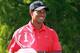 DUBLIN, OH - JUNE 03: Tiger Woods holds the winner's trophy following the Memorial Tournament presented by Nationwide Insurance at Muirfield Village Golf Club on June 3, 2012 in Dublin, Ohio. (Photo by Andy Lyons/Getty Images)
