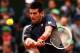 PARIS, FRANCE - JUNE 10: Novak Djokovic of Serbia plays a backhand during the men's singles final against Rafael Nadal of Spain on day 15 of the French Open at Roland Garros on June 10, 2012 in Paris, France. (Photo by Clive Brunskill/Getty Images)