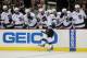 NEWARK, NJ - JUNE 09: Justin Williams #14 of the Los Angeles Kings celebrates with teammates after scoring a goal in the second period against the New Jersey Devils during Game Five of the 2012 NHL Stanley Cup Final at the Prudential Center on June 9, 2012 in Newark, New Jersey. (Photo by Elsa/Getty Images)
