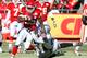 KANSAS CITY, MO - JANUARY 02: Running back Jamaal Charles #25 of the Kansas City Chiefs is tackled by linebacker Rolando McClain #55 of the Oakland Raiders in a game at Arrowhead Stadium on January 2, 2011 in Kansas City, Missouri. (Photo by Tim Umphrey/Getty Images)