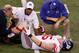 INDIANAPOLIS, IN - FEBRUARY 05: Jake Ballard #85 of the New York Giants is attended by the training staff during the game against the New England Patriots during Super Bowl XLVI at Lucas Oil Stadium on February 5, 2012 in Indianapolis, Indiana. (Photo by Gregory Shamus/Getty Images)