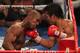 LAS VEGAS, NV - JUNE 09: (R-L) Manny Pacquiao lands a right to the head of Timothy Bradley during their WBO welterweight title fight at MGM Grand Garden Arena on June 9, 2012 in Las Vegas, Nevada. (Photo by Jeff Bottari/Getty Images)