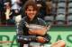 PARIS, FRANCE - JUNE 11: Rafael Nadal of Spain celebrates victory with the Coupe des Mousquetaires trophy in the men's singles final against Novak Djokovic of Serbia during day 16 of the French Open at Roland Garros on June 11, 2012 in Paris, France. (Photo by Mike Hewitt/Getty Images)