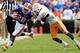 GAINESVILLE, FL - SEPTEMBER 17: Running back Jeff Demps #28 of the Florida Gators attempts tu run past defensive back Prentiss Waggner #23 of the Tennessee Volunteers during a game at Ben Hill Griffin Stadium on September 17, 2011 in Gainesville, Florida. (Photo by Sam Greenwood/Getty Images)