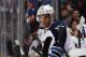 UNIONDALE, NY - APRIL 05: Evander Kane #9 of the Winnipeg Jets watches the game against the New York Islanders from the bench at the Nassau Veterans Memorial Coliseum on April 5, 2012 in Uniondale, New York. The Islanders defeated the Jets 5-4. (Photo by Bruce Bennett/Getty Images)
