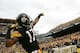 PITTSBURGH, PA - DECEMBER 04: Mike Wallace #17 of the Pittsburgh Steelers celebrates following his touchdown against the Cincinnati Bengals in the first half during the game on December 4, 2011 at Heinz Field in Pittsburgh, Pennsylvania. (Photo by Jared Wickerham/Getty Images)