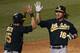 Smith and Reddick celebrate the game winning runs