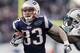 FOXBORO, MA - DECEMBER 24: Wes Welker #83 of the New England Patriots runs past Yeremiah Bell #37 of the Miami Dolphins during the fourth quarterof New England's 27-24 win at Gillette Stadium on December 24, 2011 in Foxboro, Massachusetts. (Photo by Winslow Townson/Getty Images)