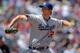 DENVER, CO - MAY 02: Starting pitcher Clayton Kershaw #22 of the Los Angeles Dodgers delivers against the at Coors Field on May 2, 2012 in Denver, Colorado. The Rockies defeated Ddogers 8-5. (Photo by Doug Pensinger/Getty Images)