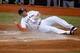 MIAMI, FL - JUNE 11: Giancarlo Stanton #27 of the Miami Marlins slides safely into home during a game against the Boston Red Sox at Marlins Park on June 11, 2012 in Miami, Florida. (Photo by Sarah Glenn/Getty Images)