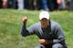 SAN FRANCISCO, CA - JUNE 14: Tiger Woods of the United States lines up a putt during the first round of the 112th U.S. Open at The Olympic Club on June 14, 2012 in San Francisco, California. (Photo by Harry How/Getty Images)