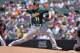 Parker dominates Rockies in A's 8-0 victory