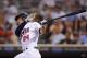 MINNEAPOLIS, MN - JUNE 14: Trevor Plouffe #24 of the Minnesota Twins hits a solo home run against the Philadelphia Phillies during the second inning on June 14, 2012 at Target Field in Minneapolis, Minnesota. (Photo by Hannah Foslien/Getty Images)