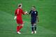 KIEV, UKRAINE - JUNE 15: Joe Hart of England shakes hands with team mate Theo Walcott after victory in the UEFA EURO 2012 group D match between Sweden and England at The Olympic Stadium on June 15, 2012 in Kiev, Ukraine. (Photo by Martin Rose/Getty Images)