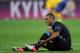 KIEV, UKRAINE - JUNE 15: Theo Walcott of England sits on the pitch injured during the UEFA EURO 2012 group D match between Sweden and England at The Olympic Stadium on June 15, 2012 in Kiev, Ukraine. (Photo by Christopher Lee/Getty Images)