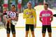 PARIS, FRANCE - JULY 24: Lance Armstrong of the USA riding for the Discovery Channel cycling team in the yellow jersey with Jan Ullrich of Germany riding for the T-Mobile team in the pink jersey and Ivan Basso Italy and his daughter riding for the CSC cycling team after stage 21 on the podium of the 92nd Tour de France between Corbeille-Essones and the Champs Elysees in Paris on July 24, 2005 on the Champs Elysees in Paris, France. (Photo by Robert Laberge/Getty Images)