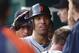 CINCINNATI, OH - JUNE 08: Quintin Berry #52 of the Detroit Tigers celebrates in the dugout after scoring during the game against the Cincinnati Reds at Great American Ball Park on June 8, 2012 in Cincinnati, Ohio. The Reds defeated the Tigers 6-5. (Photo by John Grieshop/Getty Images)