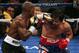 LAS VEGAS, NV - JUNE 09: (L-R) Timothy Bradley lands a left to the head of Manny Pacquiao during their WBO welterweight title fight at MGM Grand Garden Arena on June 9, 2012 in Las Vegas, Nevada. (Photo by Jeff Bottari/Getty Images)