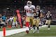 ST. LOUIS, MO - JANUARY 1: Michael Crabtree #15 of the San Francisco 49ers scores a touchdown against the St. Louis Rams at the Edward Jones Dome on January 1, 2012 in St. Louis, Missouri. (Photo by Dilip Vishwanat/Getty Images)