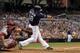 SAN DIEGO, CA - JUNE 2: Carlos Quentin #18 of the San Diego Padres hits a single against the Arizona Diamondbacks during their MLB Baseball Game on June 2, 2012 at Petco Park in San Diego, California. (Photo by Donald Miralle/Getty Images)
