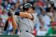 WASHINGTON, DC - JUNE 16: Mark Teixeira #25 of the New York Yankees hits a two run double in the fourteenth inning against the Washington Nationals at Nationals Park on June 16, 2012 in Washington, DC. (Photo by Patrick McDermott/Getty Images)