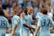 KANSAS CITY, KS - JUNE 16: Julio Cesar #55 of Sporting KC is congratulated by teammates after scoring during the MLS game against the Toronto FC on June 16, 2012 at Livestrong Sporting Park in Kansas City, Kansas. (Photo by Jamie Squire/Getty Images)