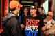 DAYTONA BEACH, FL - FEBRUARY 26: Joey Logano (L), driver of the #20 The Home Depot Toyota, speaks to professional wrestler John Cena in the garage area prior to the start of the NASCAR Sprint Cup Series Daytona 500 at Daytona International Speedway on February 26, 2012 in Daytona Beach, Florida. (Photo by Matthew Stockman/Getty Images)