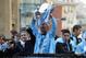 MANCHESTER, ENGLAND - MAY 14: Roberto Mancini the manager of Manchester City stands alongside his captain, Vincent Kompany (C) and Samir Nasri (R) as they parade the Barclays Premier League trophy in front of thousands of fans during their victory parade around the streets of Manchester on May 14, 2012 in Manchester, England. (Photo by Christopher Furlong/Getty Images)