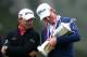 SAN FRANCISCO, CA - JUNE 17: Webb Simpson of the United States (R) looks down at the trophy as Graeme McDowell of Northern Ireland looks on after Simpson's one-stroke victory at the 112th U.S. Open at The Olympic Club on June 16, 2012 in San Francisco, California. (Photo by Ezra Shaw/Getty Images)