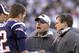New England Patriots coach Bill Belichick (right) and Josh McDaniels (center) with quarterback Tom Brady against the New York Jets in an NFL wild card playoff game Jan. 7, 2007 in Foxborough. The Pats won 37 - 16. (Photo by Al Messerschmidt/Getty Images)