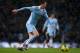 MANCHESTER, ENGLAND - FEBRUARY 04: Adam Johnson of Manchester City in action during the Barclays Premier League match between Manchester City and Fulham at the Etihad Stadium on February 4, 2012 in Manchester, England. (Photo by Alex Livesey/Getty Images)