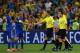 DONETSK, UKRAINE - JUNE 19: Anatoliy Tymoshchuk of Ukraine shakes hads with the match officials during the UEFA EURO 2012 group D match between England and Ukraine at Donbass Arena on June 19, 2012 in Donetsk, Ukraine. (Photo by Martin Rose/Getty Images)