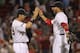 BOSTON, MA - JUNE 19: Adrian Gonzalez #28 of the Boston Red Sox celebrates a 7-5 win over the Miami Marlins with Mike Aviles #3 after interleague play at Fenway Park June 19, 2012 in Boston, Massachusetts. (Photo by Jim Rogash/Getty Images)