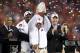 GLENDALE, AZ - JANUARY 10: Head coach Gene Chizik of the Auburn Tigers celebrates the Tigers 22-19 victory against the Oregon Ducks during the Tostitos BCS National Championship Game at University of Phoenix Stadium on January 10, 2011 in Glendale, Arizona. (Photo by Christian Petersen/Getty Images)