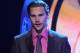 The Senators' Erik Karlsson accepts the Norris Trophy.