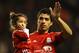LIVERPOOL, ENGLAND - MAY 08: Luis Suarez of Liverpool carries his daughter Delfina Suarez as he waves to the fans during the Barclays Premier League match between Liverpool and Chelsea at Anfield on May 8, 2012 in Liverpool, England. (Photo by Alex Livesey/Getty Images)