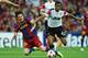 LONDON, ENGLAND - MAY 28: Lionel Messi of FC Barcelona (L) is challenged by Luis Antonio Valencia of Manchester United during the UEFA Champions League final between FC Barcelona and Manchester United FC at Wembley Stadium on May 28, 2011 in London, England. (Photo by Laurence Griffiths/Getty Images)