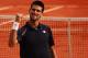 PARIS, FRANCE - JUNE 08: Novak Djokovic of Serbia celebrates victory in his men's singles semi final match against Roger Federer of Switzerland during day 13 of the French Open at Roland Garros on June 8, 2012 in Paris, France. (Photo by Clive Brunskill/Getty Images)