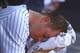 NEW YORK, NY - JUNE 20: Phil Hughes #65 of the New York Yankees sits in the dugout after being removed from the game in the fifth inning against the Atlanta Braves during their game on June 20, 2012 at Yankee Stadium in the Bronx borough of New York City. (Photo by Al Bello/Getty Images)