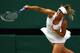 LONDON, ENGLAND - JULY 02: Maria Sharapova of Russia in action during her Ladies' final round match against Petra Kvitova of the Czech Republic on Day Twelve of the Wimbledon Lawn Tennis Championships at the All England Lawn Tennis and Croquet Club on July 2, 2011 in London, England. (Photo by Clive Brunskill/Getty Images)