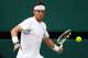 LONDON, ENGLAND - JULY 03: Rafael Nadal of Spain lines up a shot during his final round Gentlemen's match against Novak Djokovic of Serbia on Day Thirteen of the Wimbledon Lawn Tennis Championships at the All England Lawn Tennis and Croquet Club on July 3, 2011 in London, England. (Photo by Julian Finney/Getty Images)