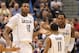 HARTFORD, CT - JANUARY 9: Andre Drummond #12 of the Connecticut Huskies celebrates with teammates Ryan Boatright #11 and Alex Oriakhi #34 during a game against the West Virginia Mountaineers in the second half at the XL Center on January 9, 2012 in Hartford, Connecticut. (Photo by Jim Rogash/Getty Images)