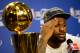 MIAMI, FL - JUNE 21: LeBron James #6 of the Miami Heat answers questions from the media next to the Larry O'Brien Finals Championship trophy during his post game press conference after they won 121-106 against the Oklahoma City Thunder in Game Five of the 2012 NBA Finals on June 21, 2012 at American Airlines Arena in Miami, Florida. NOTE TO USER: User expressly acknowledges and agrees that, by downloading and or using this photograph, User is consenting to the terms and conditions of the Getty Images License Agreement. (Photo by Ronald Martinez/Getty Images)
